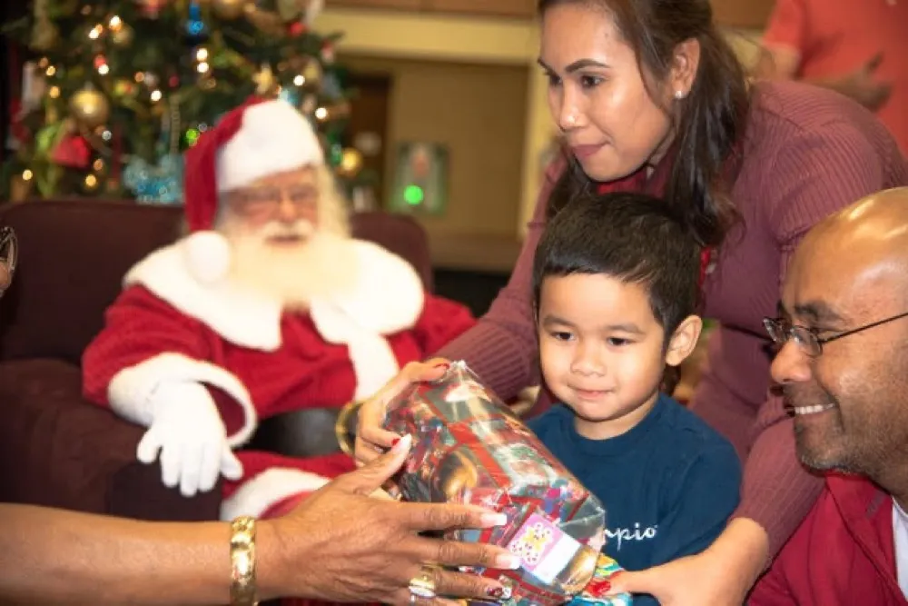 Child opening gift