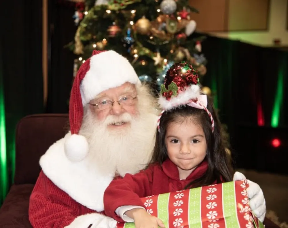 Santa with child and gift